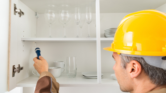 A handyman in a hardhat