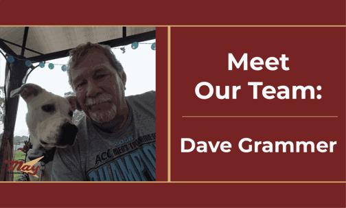 A photo of Dave Grammer and his dog