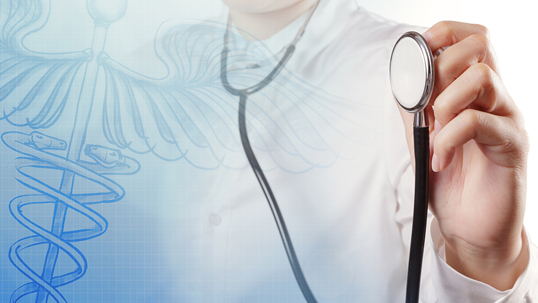 A medical professional holds a stethoscope